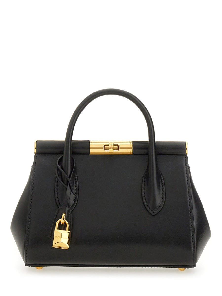 DOLCE & GABBANA Elegant Leather Handbag with Twist-Lock Closure for Women