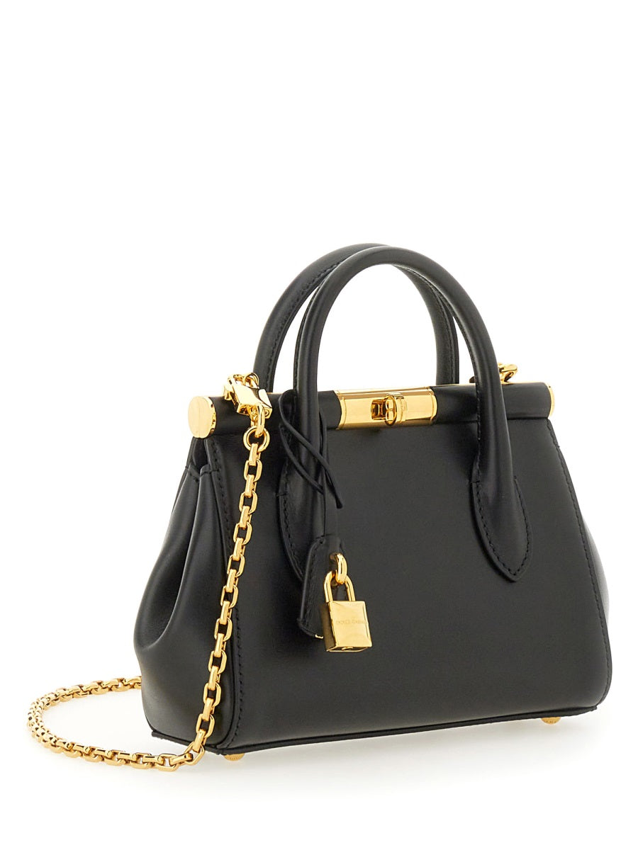 DOLCE & GABBANA Elegant Leather Handbag with Twist-Lock Closure for Women