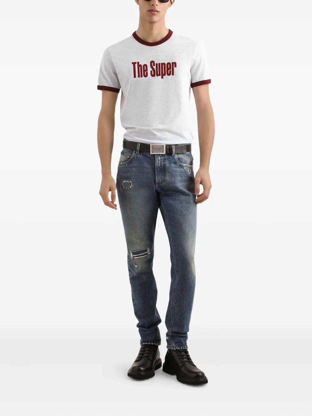 DOLCE & GABBANA Faded Distressed Jeans with Logo Plaque