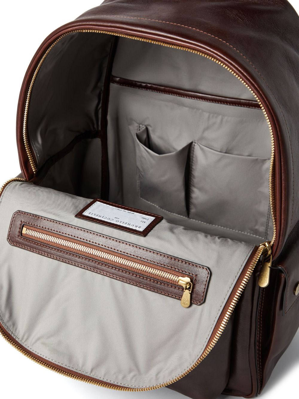 BRUNELLO CUCINELLI Leather Backpack with Adjustable Straps and Multiple Pockets