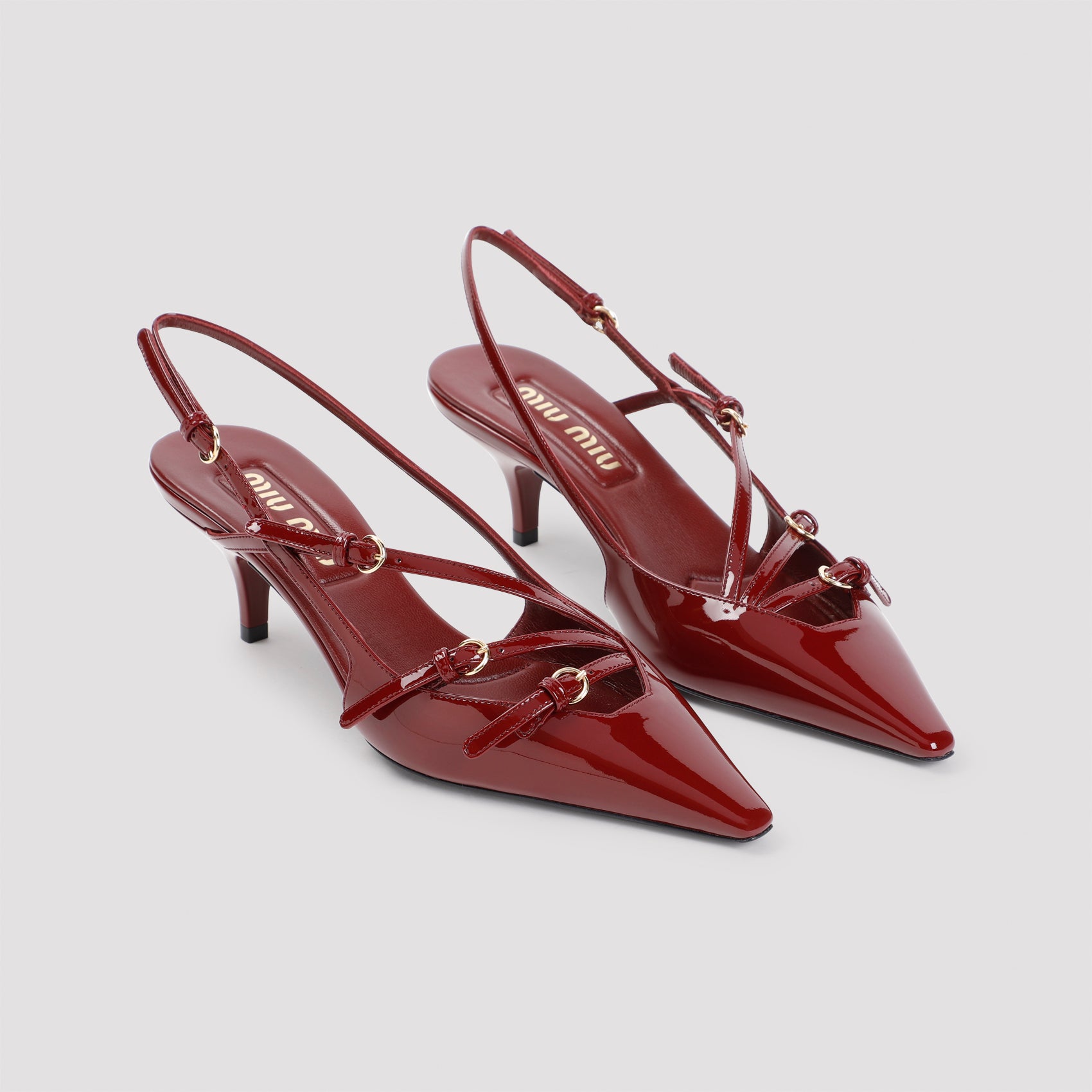 MIU MIU Elegant Pointed Toe Slingback Pumps