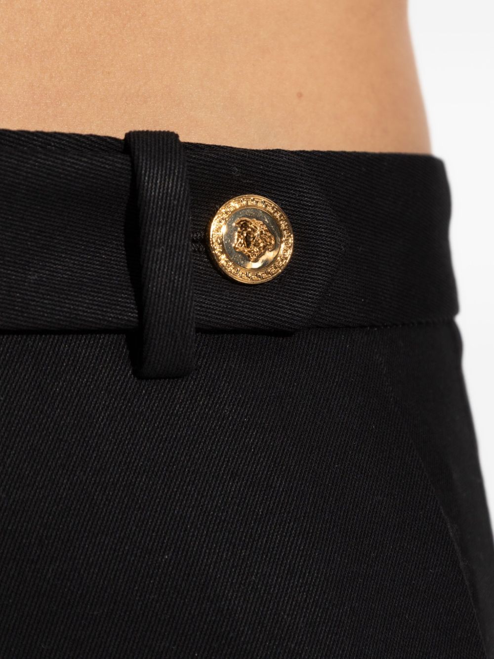 VERSACE Low-Waisted Baggy Trousers with Gold Accent